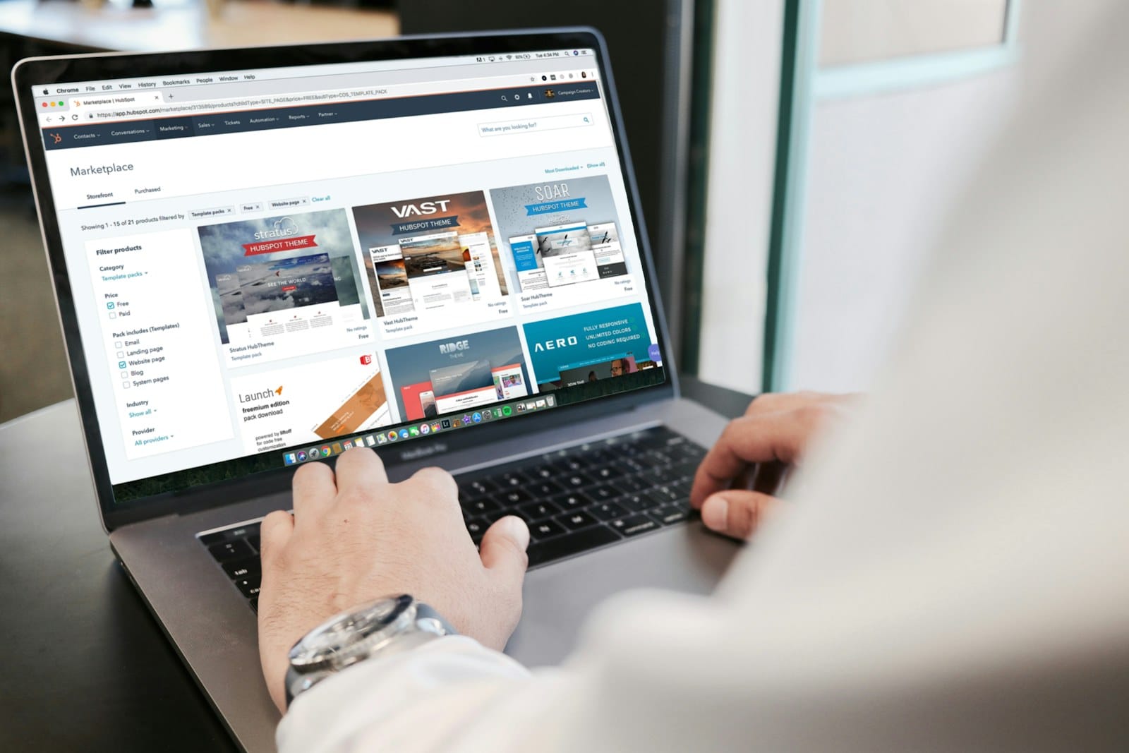 A marketing platform open on a laptop in an office.